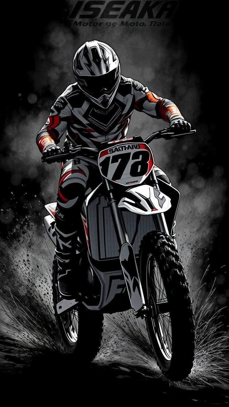 Motocross Rider Wearing A Helmet And Racing