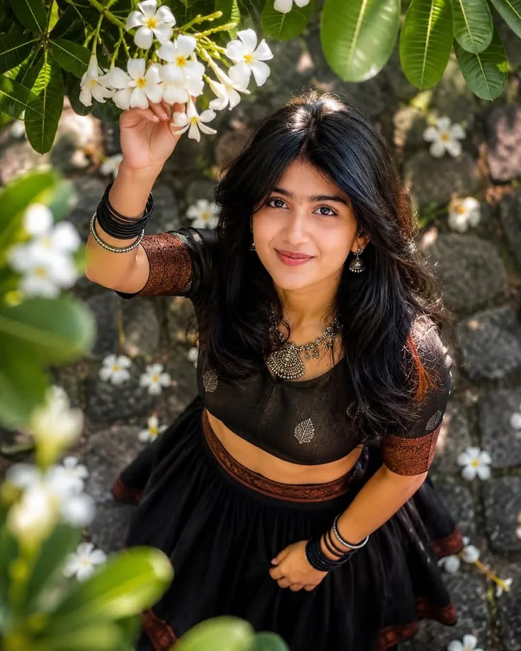 Radiant Black Lehenga Floral Portrait, Overhead Frangipani South Asian Beauty, Serene Cobblestone Garden Ethnic Aestheti