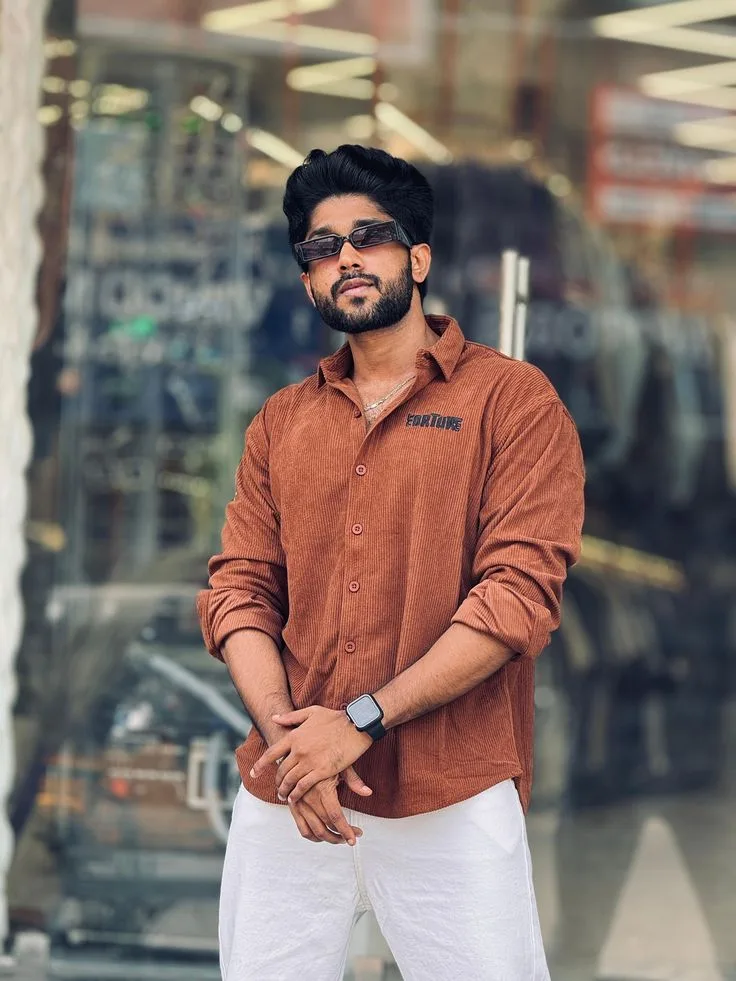 Candid Outdoor Street Portrait of Stylish Indian Man in Rust Corduroy Shirt